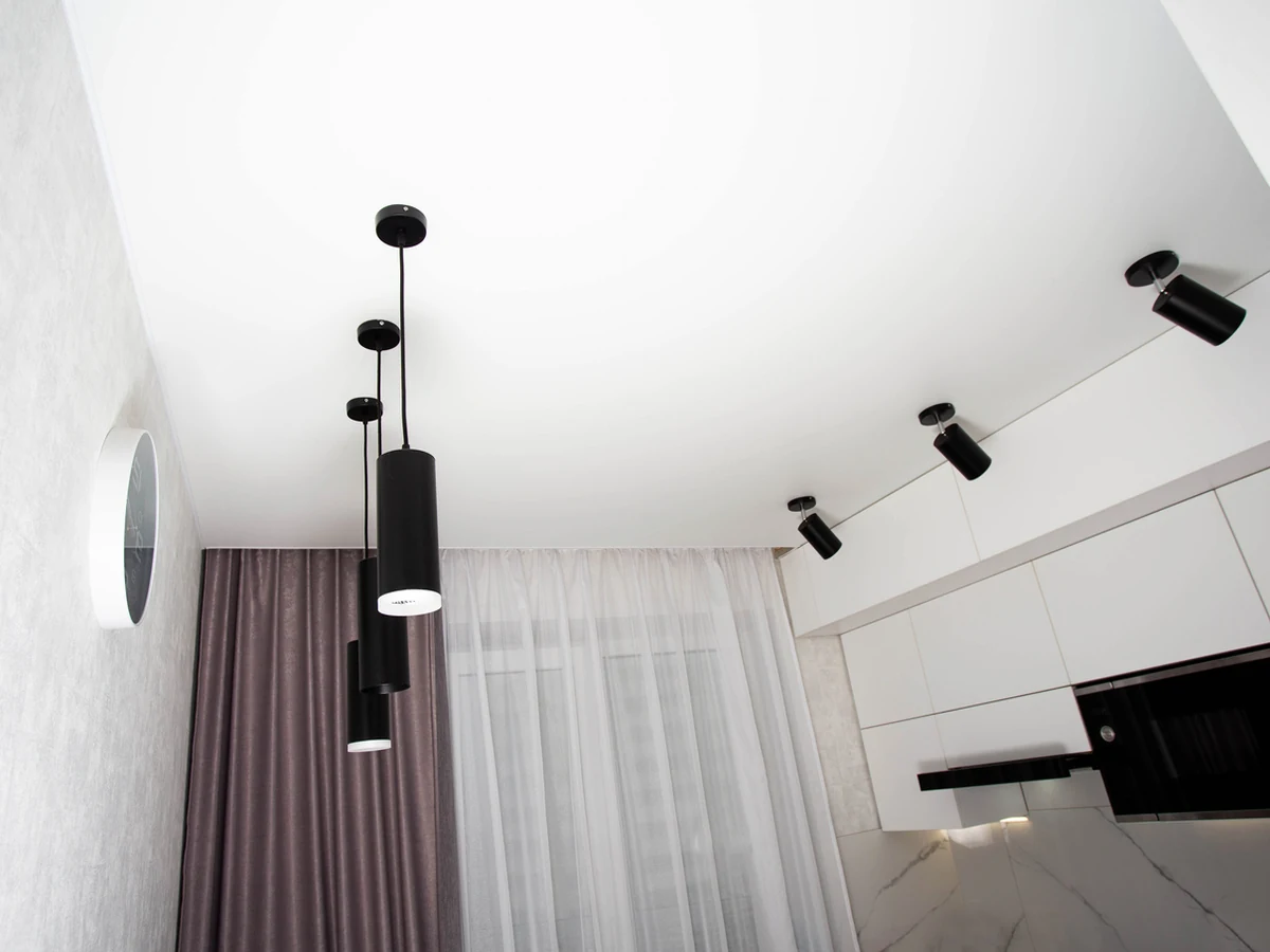 White ceiling painting with black contrast walls in Windsor property by Windsor Decorators