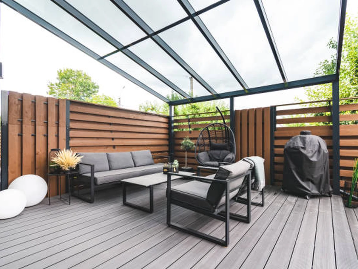 Covered outdoor deck with professional painted finish by Windsor Decorators