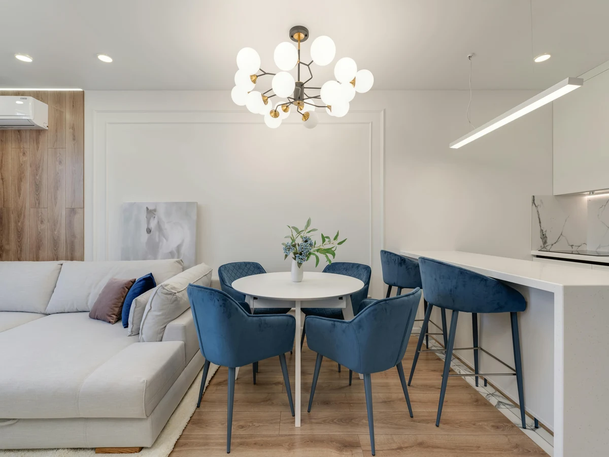 Open plan dining area painted by Windsor Decorators