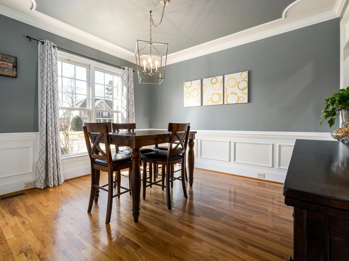Slate blue dining room painted by professional decorators in Windsor