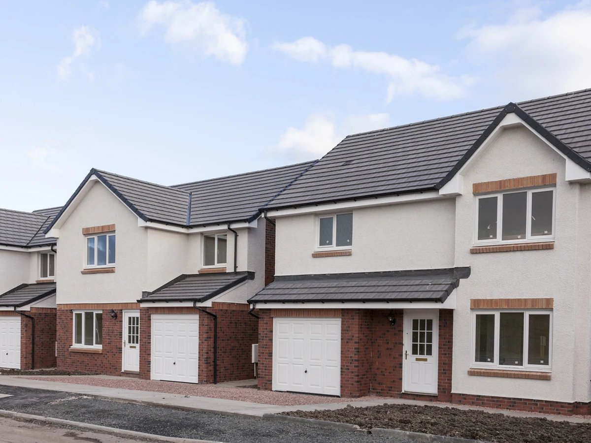 exterior-painting-row-white-rendered-windsor-decorators Masonry painting service in Windsor for rendered brick and stone