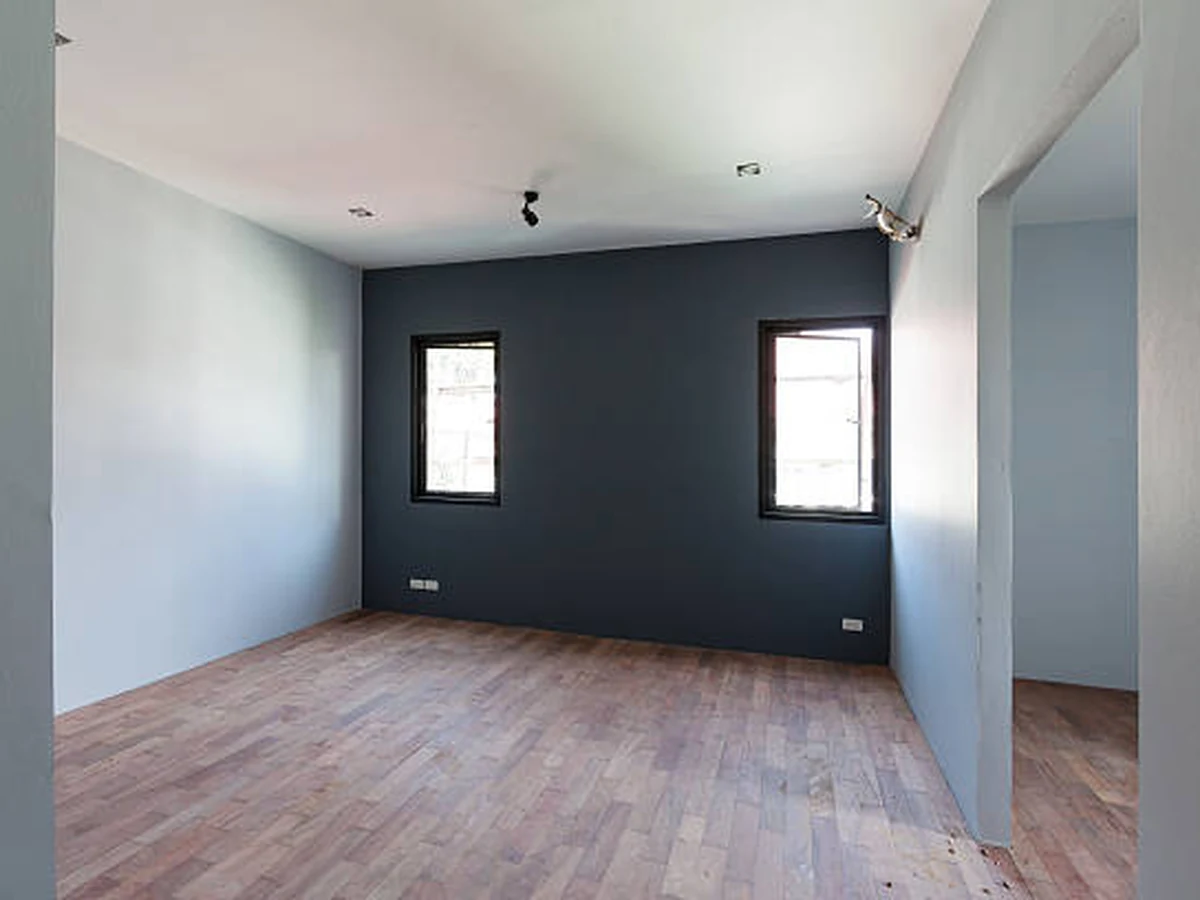 Dark painted empty room interior in Windsor property