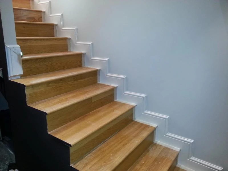 Painted stair wall and white trim by PA Painting & Decorating — Windsor Decorators