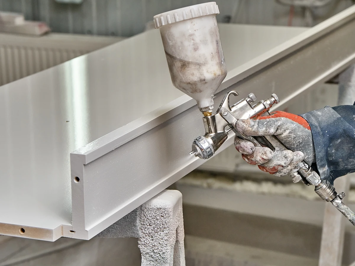 painting-decorating-closeup-spray-gun-windsor-decorators Professional painting preparation and application