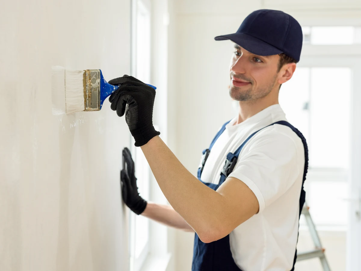 Professional painter at work on an Eton period property by Windsor Decorators